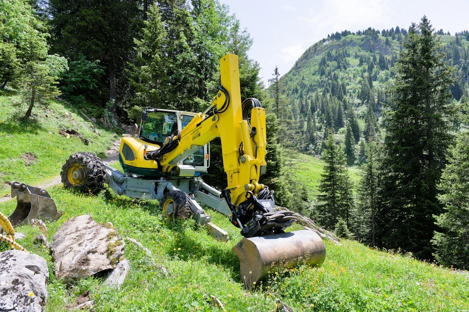 Excavator positioned on uneven ground near an excavation slope